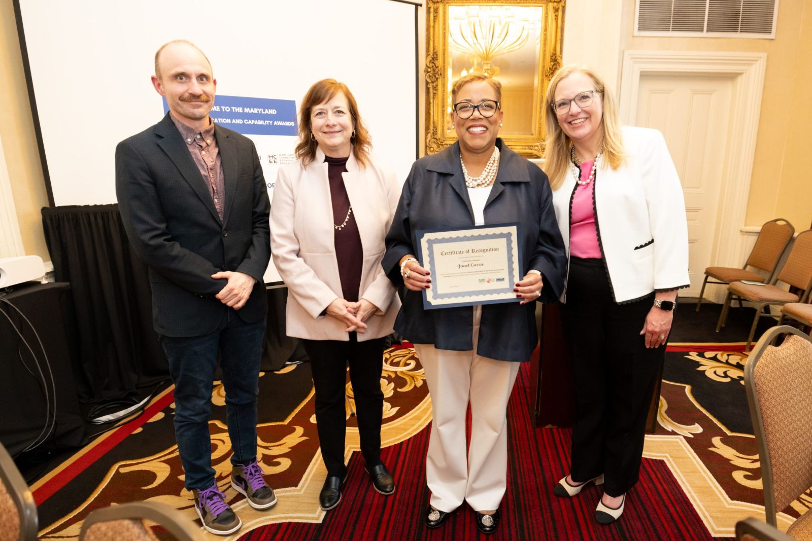 Bank of America President Janet Currie accepts 2025 Community Champion ...